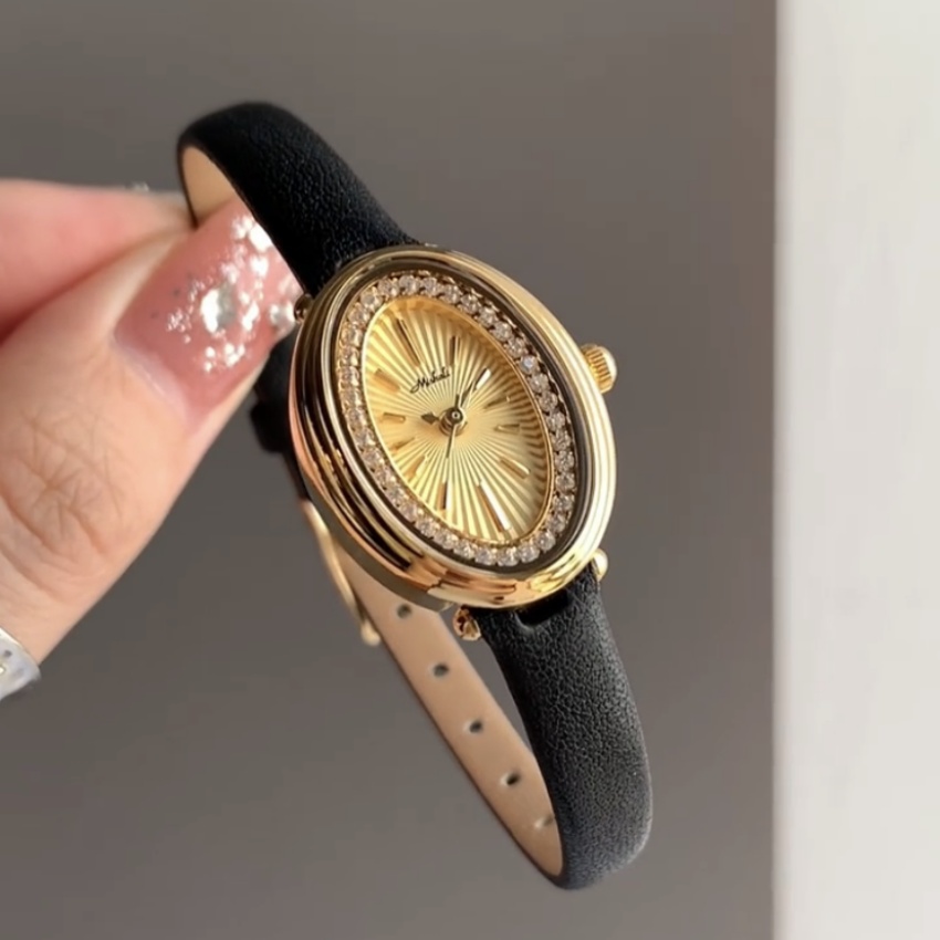 Vintage Gold Small Oval Face Leather Watch