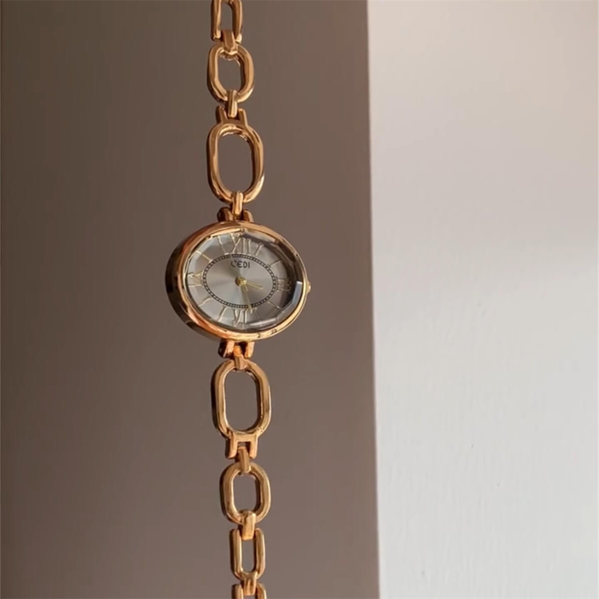 Women’s Oval Face Gold Bracelet Watch