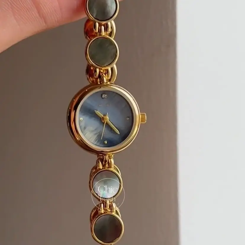 Womens Gold Round Face Watch Blue Mother of Pearl Watch