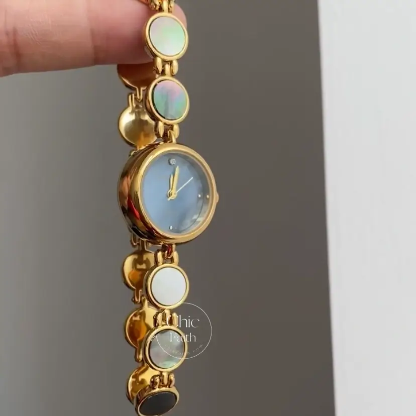 Womens Gold Round Face Watch Blue Mother of Pearl Watch