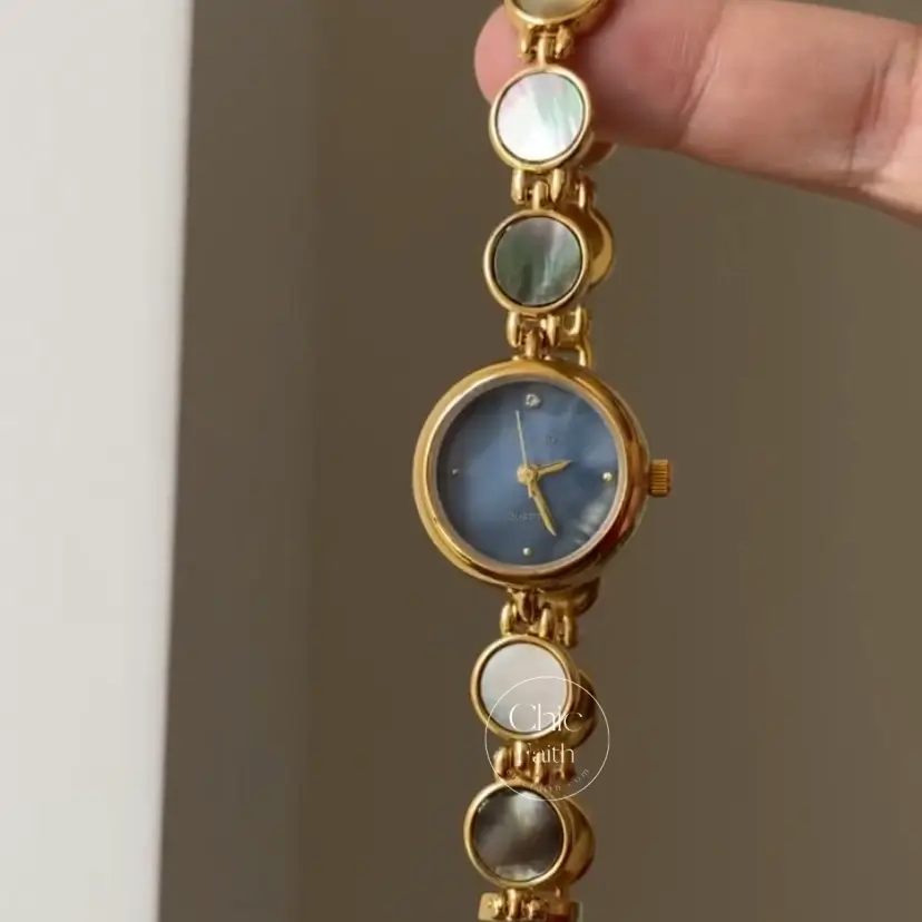 Womens Gold Round Face Watch Blue Mother of Pearl Watch