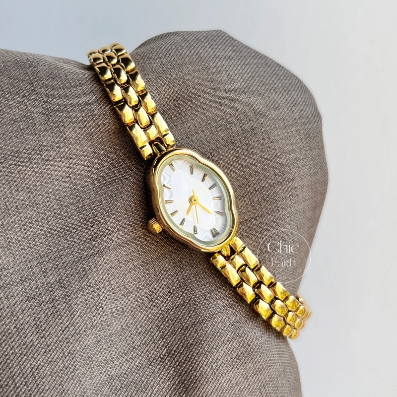 Dainty Golden Oval flower Dial Metal Bracelet Women's Watch