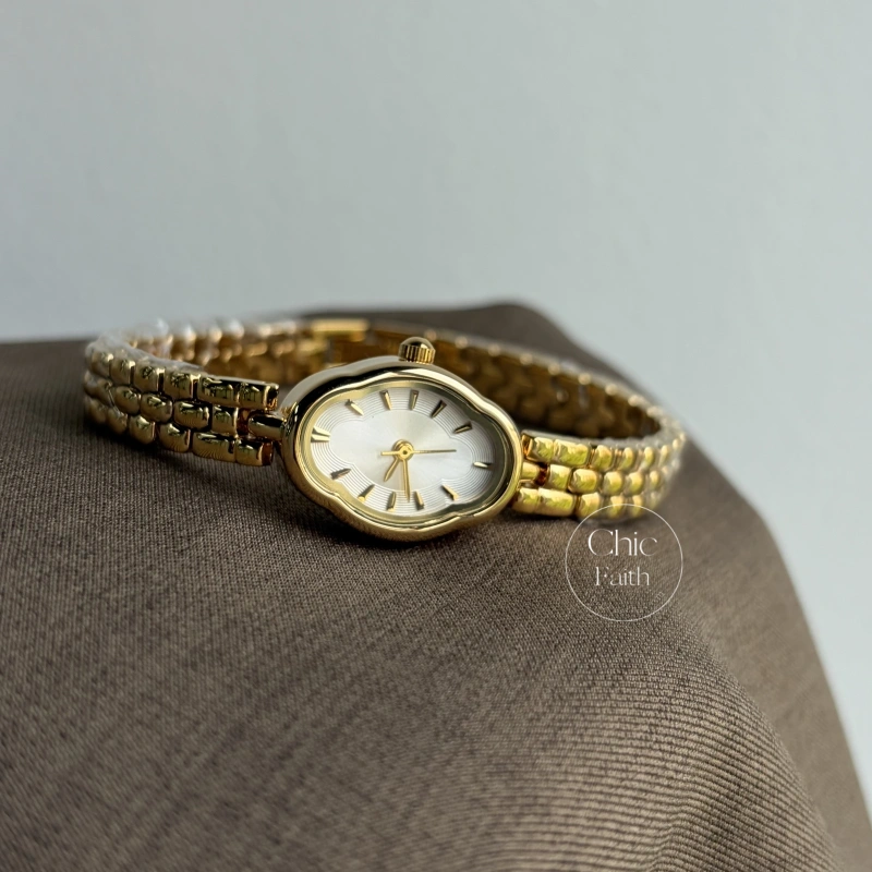 Dainty Golden Oval flower Dial Metal Bracelet Women's Watch
