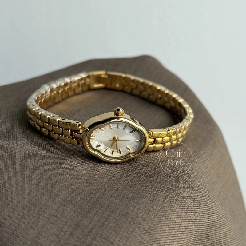 Dainty Golden Oval flower Dial Metal Bracelet Women's Watch