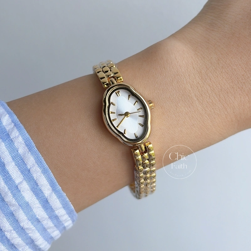 Dainty Golden Oval flower Dial Metal Bracelet Women's Watch